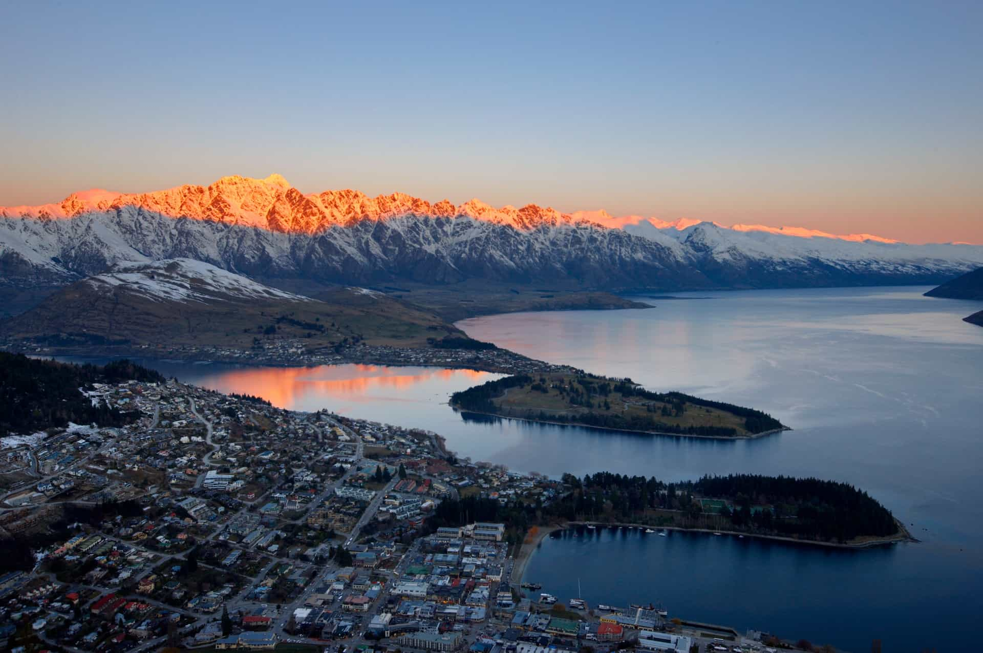 Queenstown at sunset — the Remarkables glowing over Lake Wakatipu